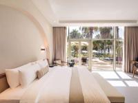 Rixos The Palm Hotel &amp; Suites - Ultra All Inclusive客房内的一张或多张床位