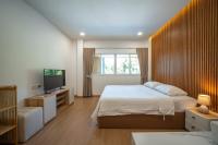 Baan San sook Pool Villa at Nimman客房内的一张或多张床位