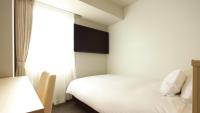 AB Hotel Shiojiri客房内的一张或多张床位