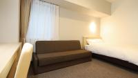 AB Hotel Shiojiri客房内的一张或多张床位