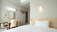 AB Hotel Shiojiri客房内的一张或多张床位