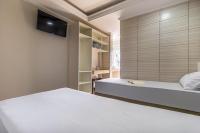 Hotel Age - Próximo Arena Corinthians e Aeroporto de Guarulhos客房内的一张或多张床位