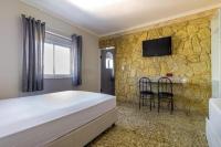 Hotel Age - Próximo Arena Corinthians e Aeroporto de Guarulhos客房内的一张或多张床位