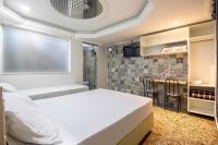 Hotel Age - Próximo Arena Corinthians e Aeroporto de Guarulhos客房内的一张或多张床位