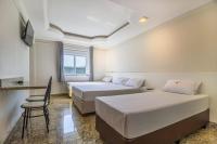 Hotel Age - Próximo Arena Corinthians e Aeroporto de Guarulhos客房内的一张或多张床位