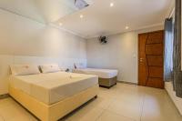 Hotel Age - Próximo Arena Corinthians e Aeroporto de Guarulhos客房内的一张或多张床位