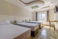 Hotel Age - Próximo Arena Corinthians e Aeroporto de Guarulhos客房内的一张或多张床位