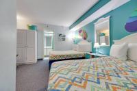 The 7th Heaven in Myrtle Beach客房内的一张或多张床位
