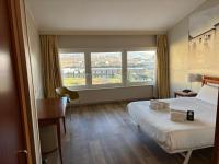 B&B Hotel Affi - Lago di Garda客房内的一张或多张床位