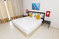 Le Petit Palais Djerba & Spa客房内的一张或多张床位