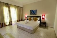 Le Petit Palais Djerba & Spa客房内的一张或多张床位