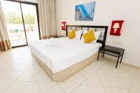 Le Petit Palais Djerba & Spa客房内的一张或多张床位