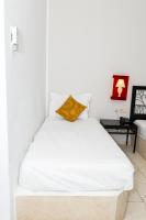 Le Petit Palais Djerba & Spa客房内的一张或多张床位