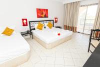 Le Petit Palais Djerba & Spa客房内的一张或多张床位