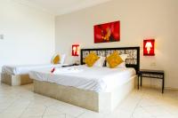 Le Petit Palais Djerba & Spa客房内的一张或多张床位