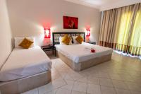 Le Petit Palais Djerba & Spa客房内的一张或多张床位