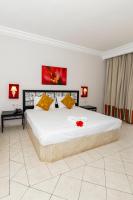Le Petit Palais Djerba & Spa客房内的一张或多张床位