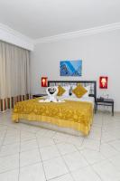 Le Petit Palais Djerba & Spa客房内的一张或多张床位