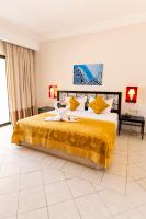 Le Petit Palais Djerba & Spa客房内的一张或多张床位
