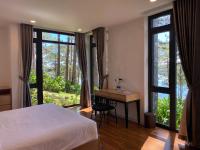 Lan Anh Villas Resort客房内的一张或多张床位