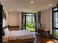 Lan Anh Villas Resort客房内的一张或多张床位