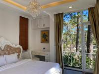 Lan Anh Villas Resort客房内的一张或多张床位