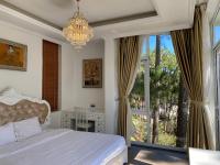 Lan Anh Villas Resort客房内的一张或多张床位