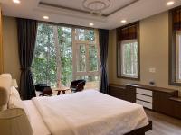 Lan Anh Villas Resort客房内的一张或多张床位