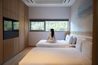 Mer de laube Hotel客房内的一张或多张床位