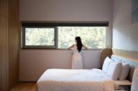 Mer de laube Hotel客房内的一张或多张床位