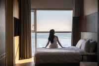 Mer de laube Hotel客房内的一张或多张床位