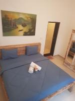Ceria House Ungasan Uluwatu客房内的一张或多张床位