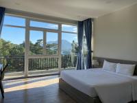 Lan Anh Villas Resort客房内的一张或多张床位