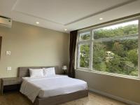 Lan Anh Villas Resort客房内的一张或多张床位