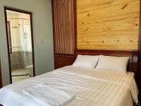NHỚ House IV客房内的一张或多张床位