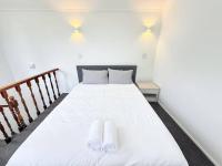 Unit 2, Fenton Summer Lodge客房内的一张或多张床位
