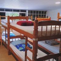 Hostel Dumah - santana客房内的一张或多张床位