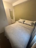 Flat Estaza Luxo Moema Ibirapuera com garagem piscina 202客房内的一张或多张床位