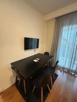Flat Estaza Luxo Moema Ibirapuera com garagem piscina 202的电视和/或娱乐中心