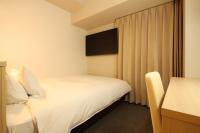 AB Hotel Shiojiri客房内的一张或多张床位