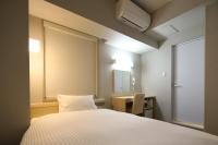 AB Hotel Shiojiri客房内的一张或多张床位