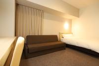 AB Hotel Shiojiri客房内的一张或多张床位