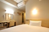 AB Hotel Shiojiri客房内的一张或多张床位