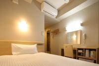 AB Hotel Shiojiri客房内的一张或多张床位
