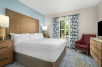 Sheraton Broadway Resort Villas客房内的一张或多张床位