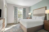 Sheraton Broadway Resort Villas客房内的一张或多张床位