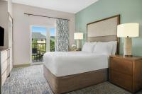 Sheraton Broadway Resort Villas客房内的一张或多张床位