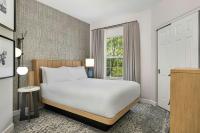 Sheraton Broadway Resort Villas客房内的一张或多张床位
