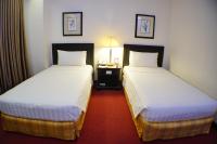 Bayview Park Hotel Manila客房内的一张或多张床位
