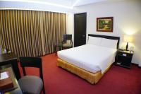 Bayview Park Hotel Manila客房内的一张或多张床位